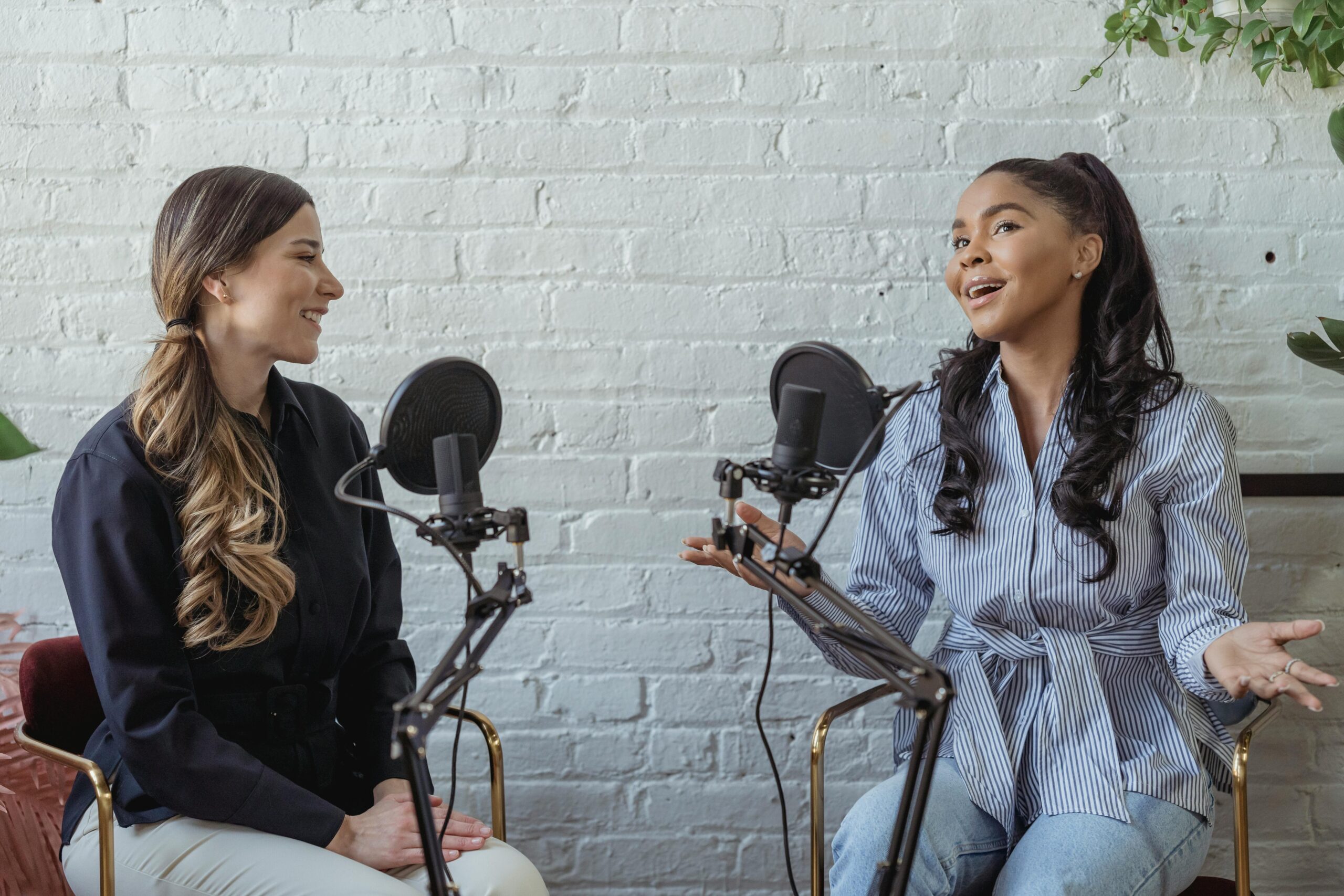 two women at a podcast